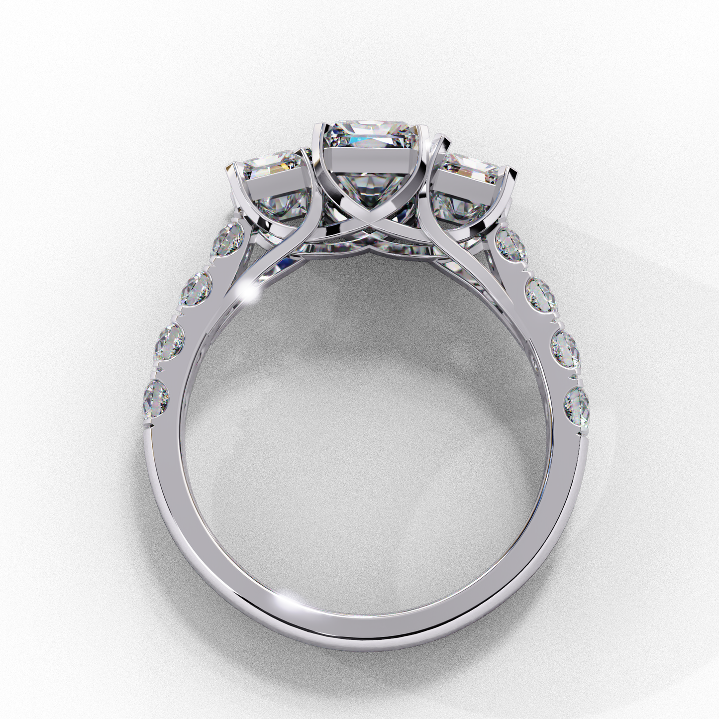 3 Emeralds Solitaire Ring