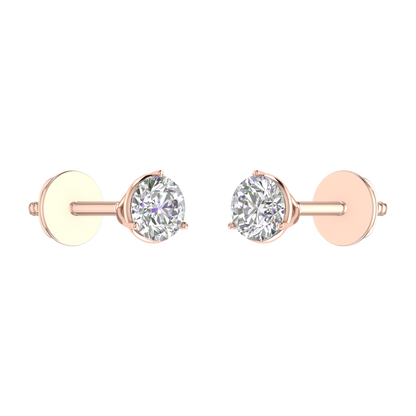 0.15 carat each 3 prong setting Round Diamond Earrings